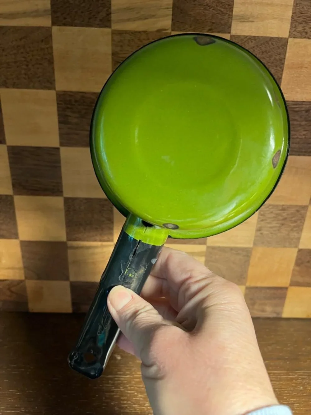 Vintage Small Avocado Green Enamel Pan with Black Handle, shows wear
